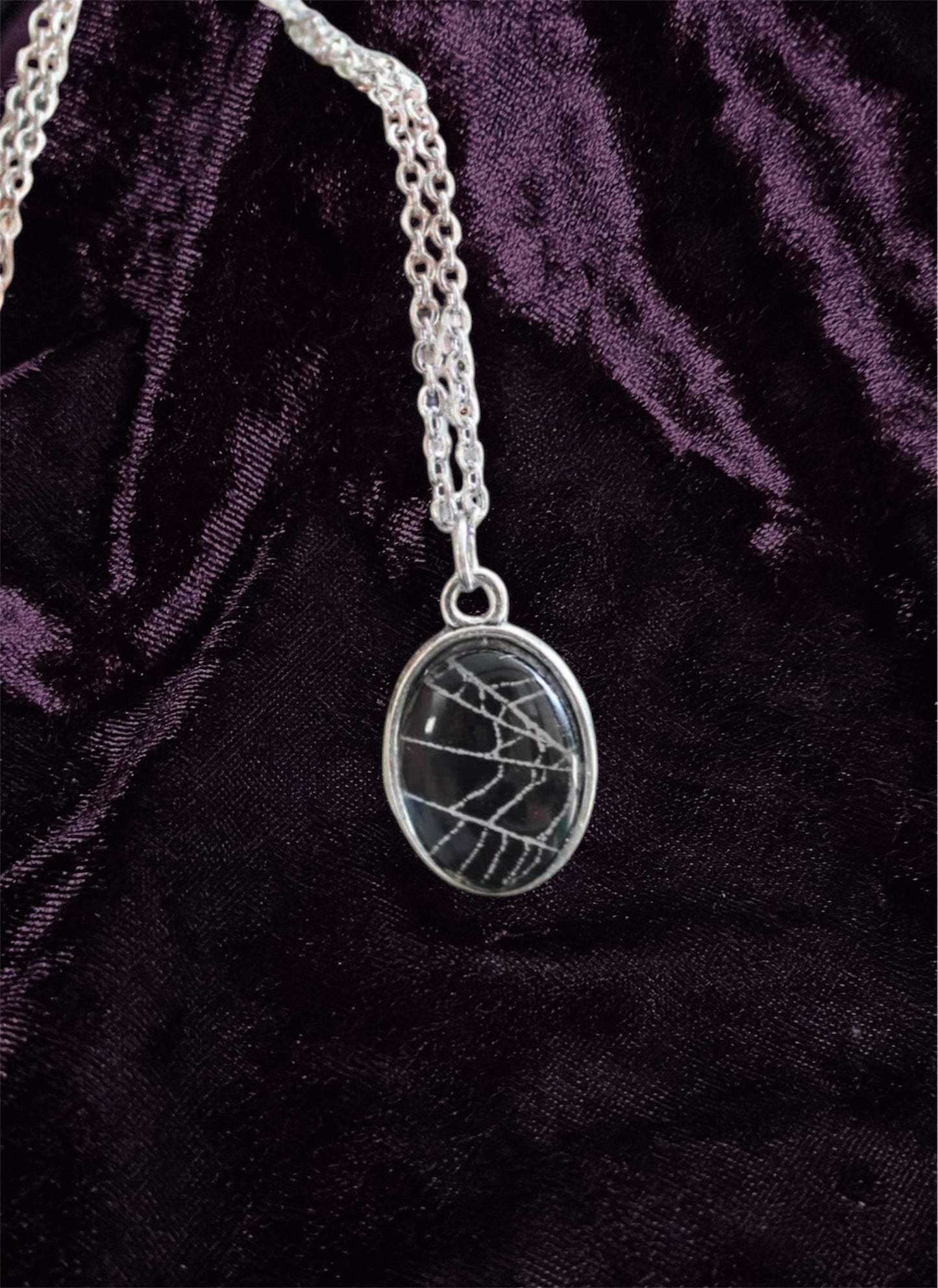 Small spider web necklace oddity